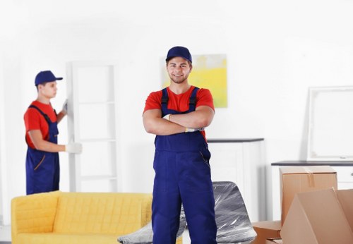 Packed boxes and furniture prepared for removal truck hire