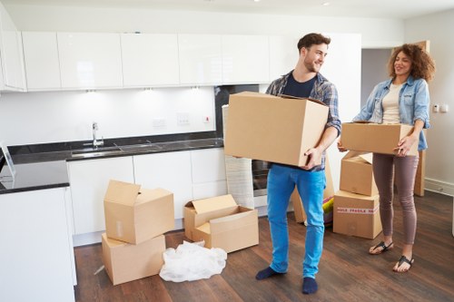 Professional man and van helping with boxes and household items in Thornton Heath